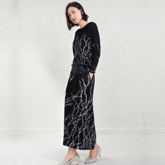 Pleated Batwing Top and Back-Slit Skirt Set – Modern Two-Piece Outfit